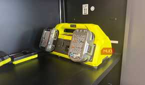 ryobi 6 port fast charger in garage cabinet