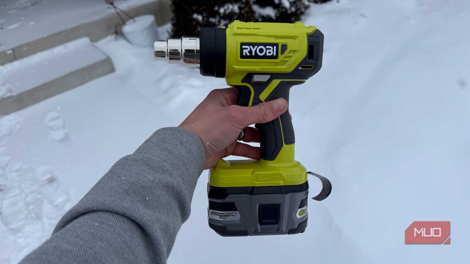 ryobi heat gun left side in hand with snow