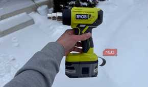 ryobi heat gun left side in hand with snow