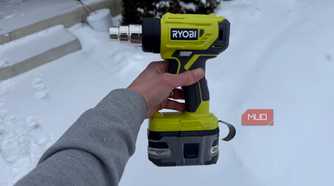 ryobi heat gun left side in hand with snow