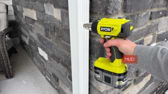 ryobi heat gun pointing at downspout
