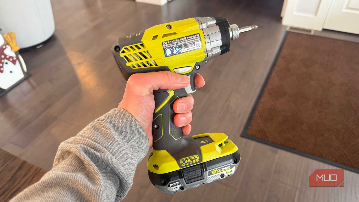 ryobi impact drill with finger on trigger-1