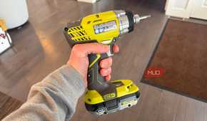 ryobi impact drill with finger on trigger-1