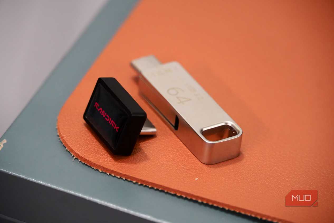 The sandisk extreme fit flash drive compared to a normal 64GB drive.