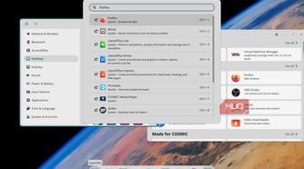 Fedora COSMIC running multiple apps with the app launcher open