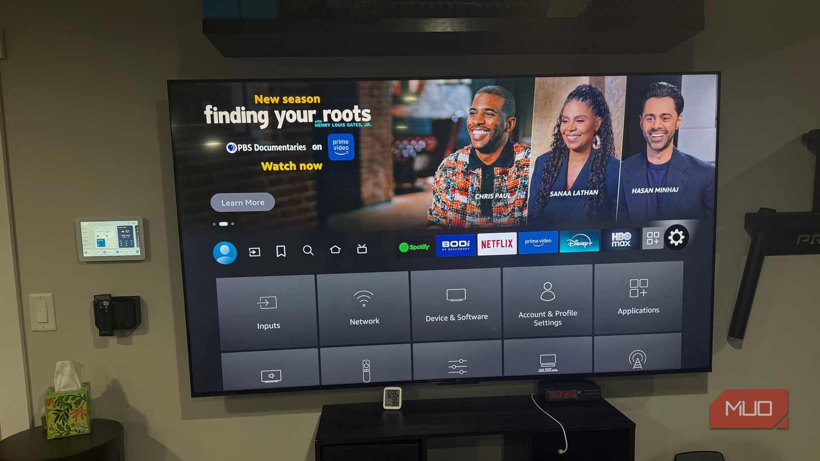 TCL Fire TV settings with finding your roots ad