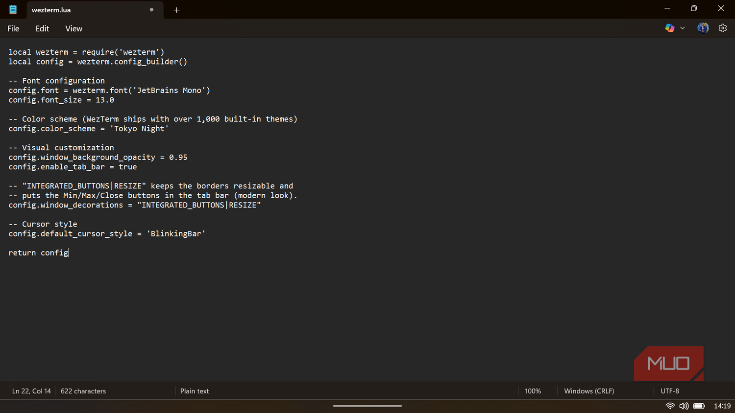 Text editor displaying the Lua configuration script for WezTerm with settings for fonts and color schemes.-1