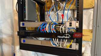 ubiquiti router and network switch on rack