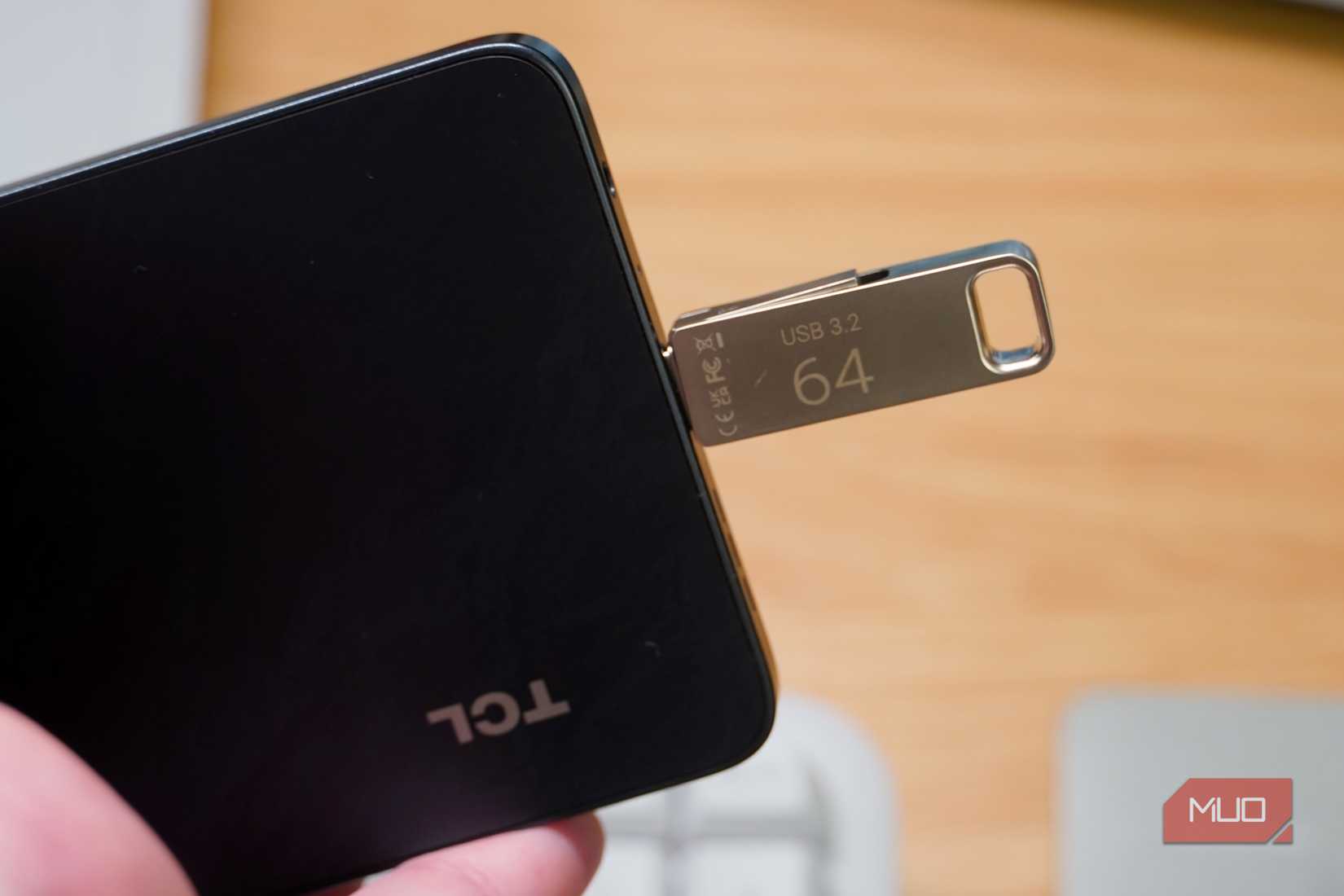 A USB-C drive plugged into an Android phone.