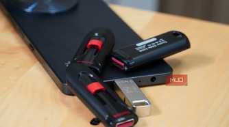 USB drives scattered around a smartphone.