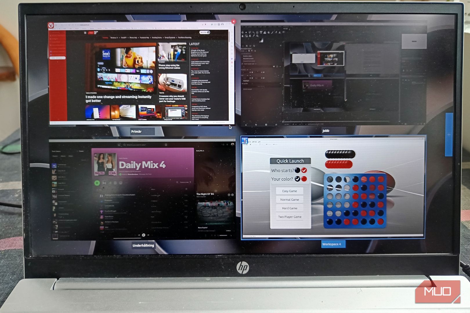 Virtual desktops displayed on a laptop screen