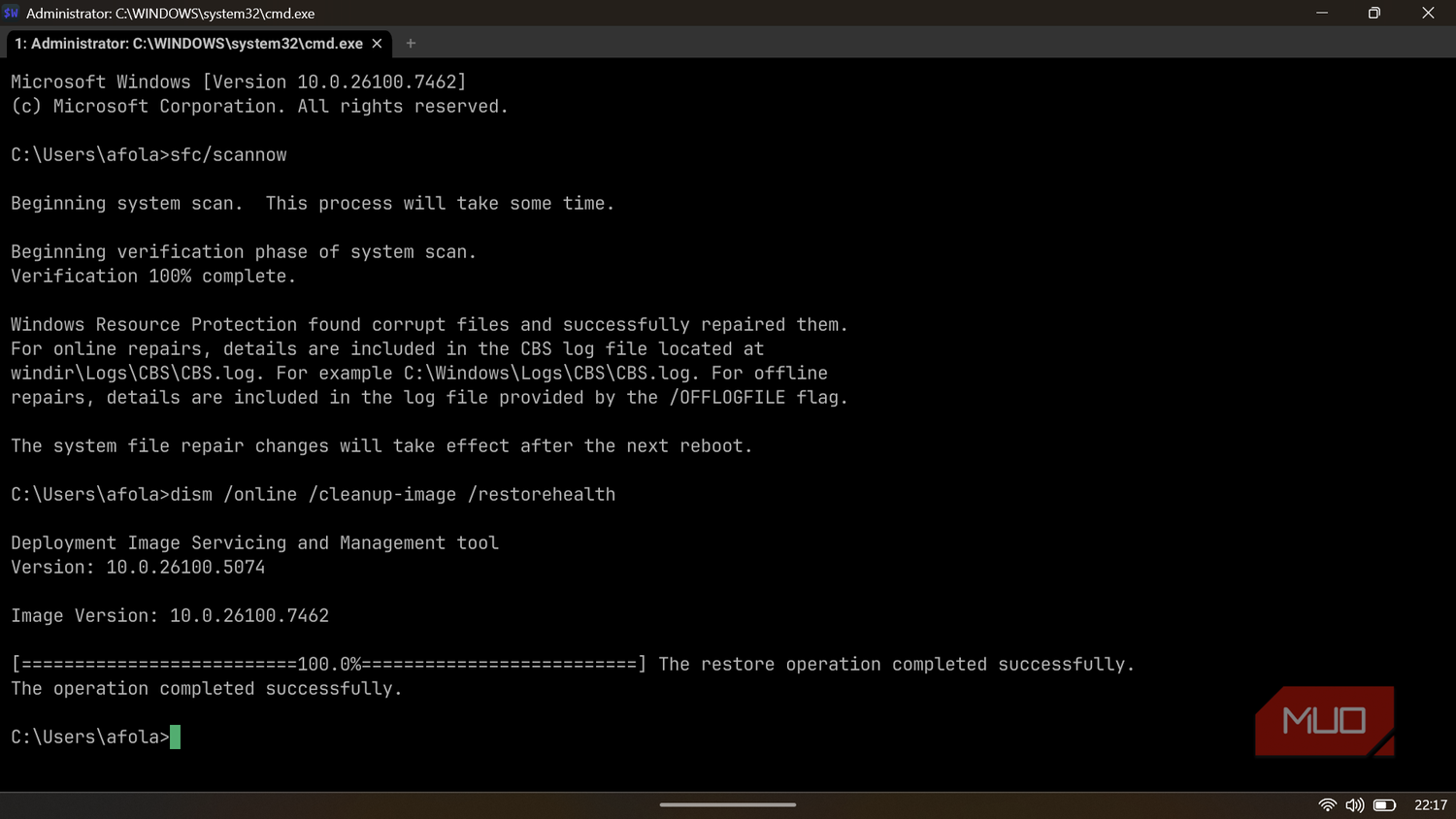WezTerm terminal showing the successful results of SFC and DISM system repair commands.