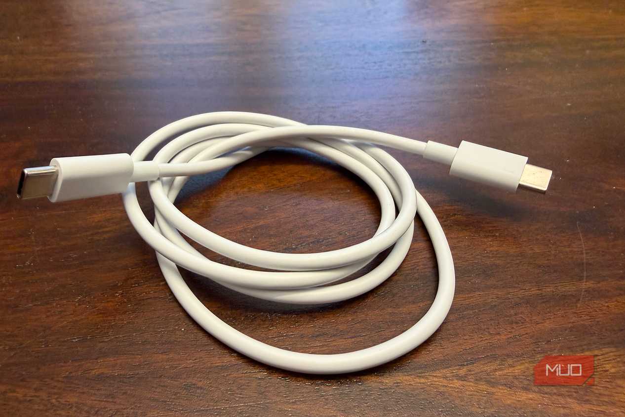 A bundled up white USB-C cable