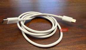 A bundled up white USB-C cable