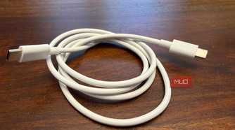 A bundled up white USB-C cable