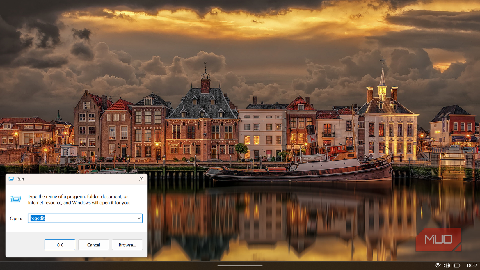 Windows Run dialog box with regedit typed in to launch the Registry Editor.