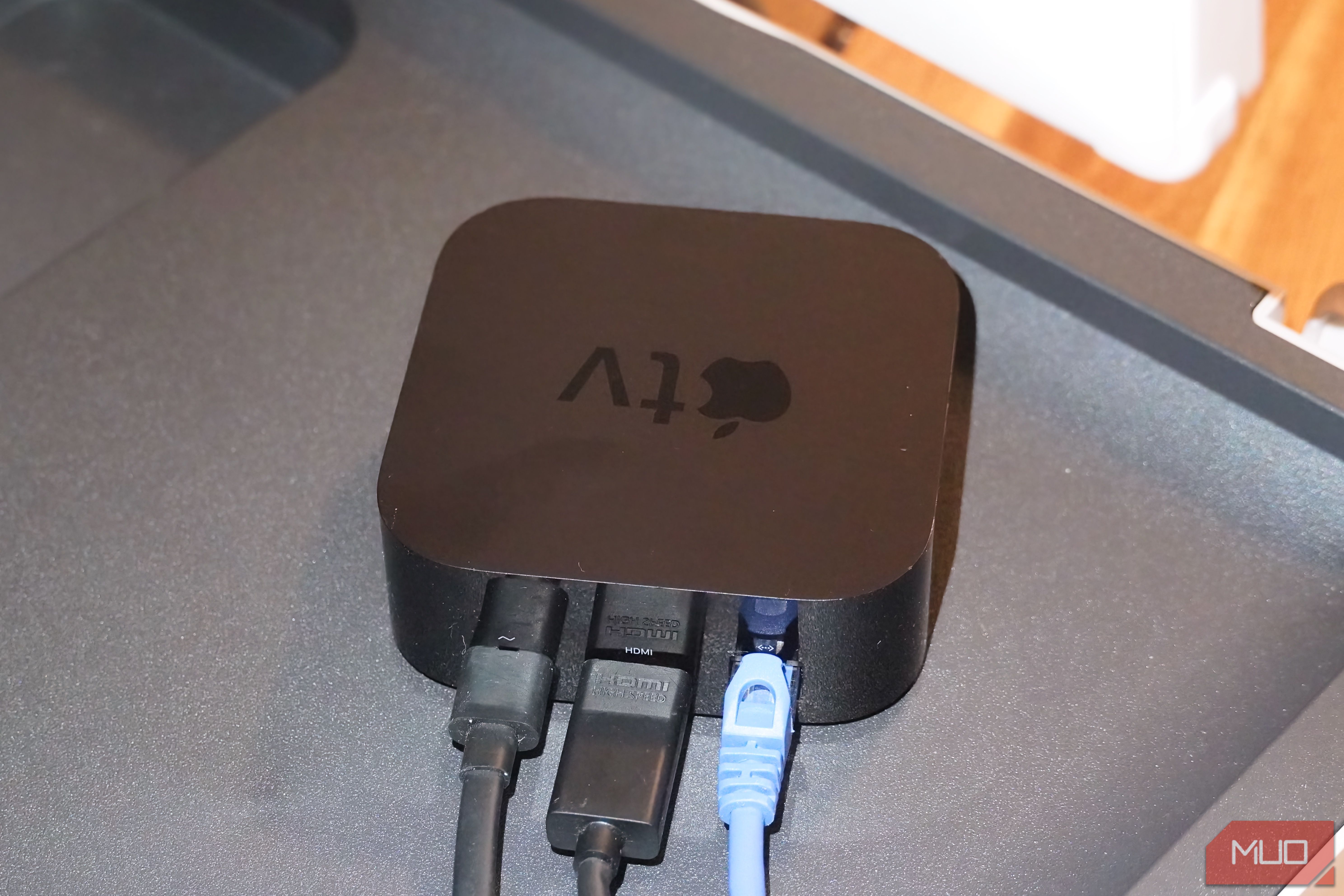 Cables plugged into an Apple TV.