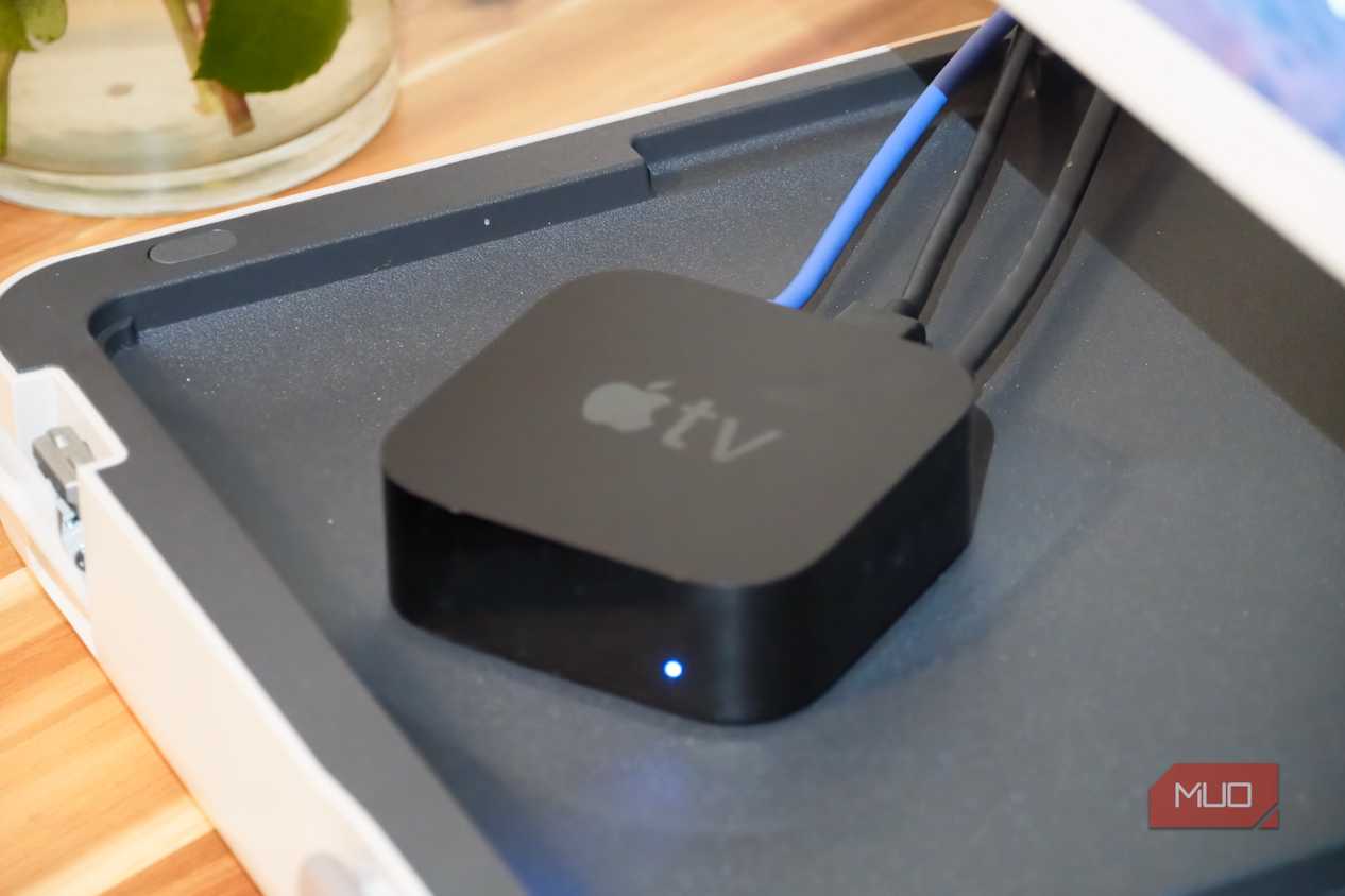 An Apple TV with a Gigabit Ethernet cable connected.