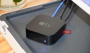 An Apple TV with a Gigabit Ethernet cable connected.