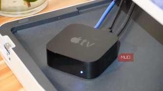 An Apple TV with a Gigabit Ethernet cable connected.