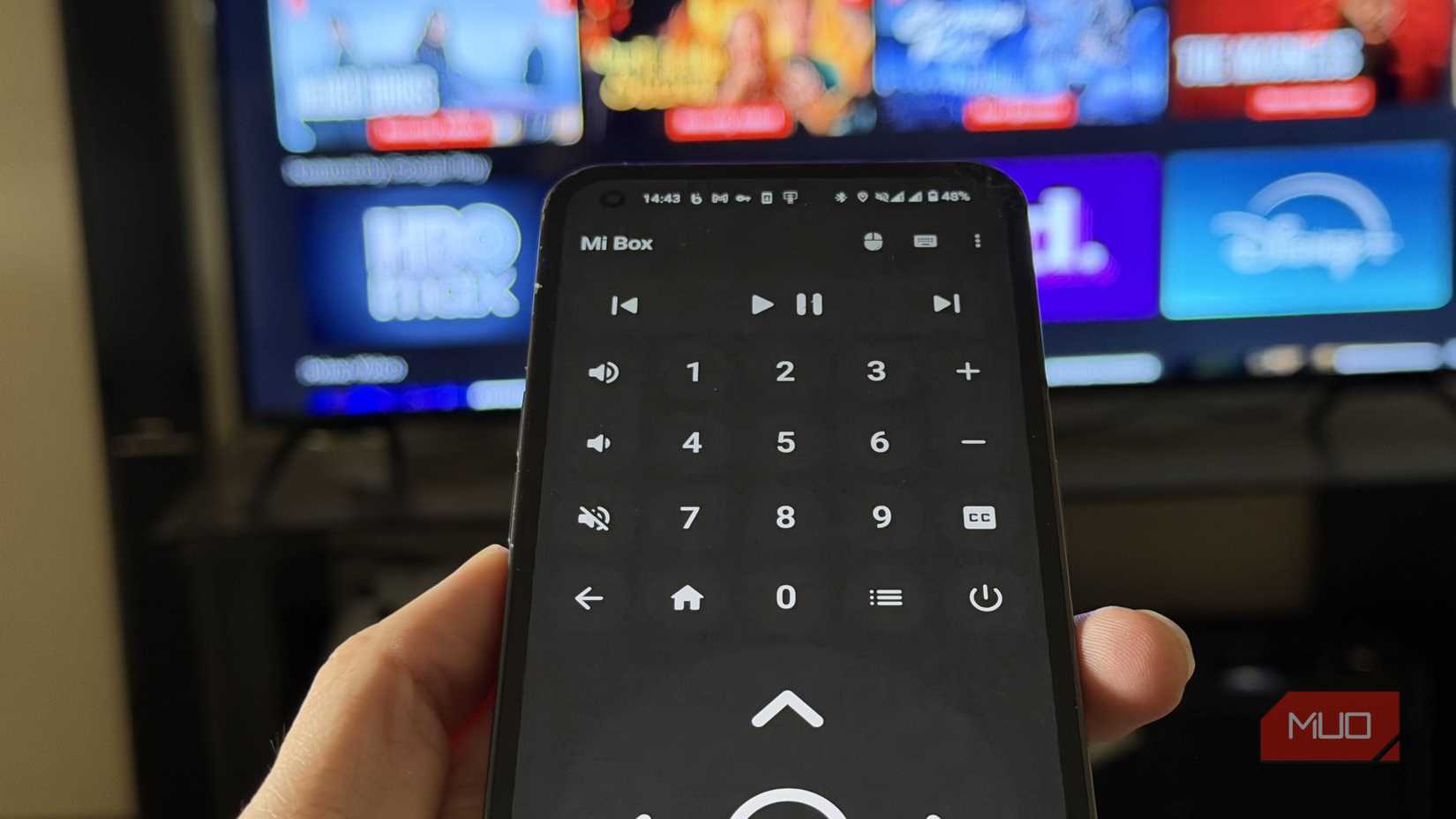 BT Remote app on an Android phone next to a smart TV