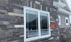 double casement window stone veneer