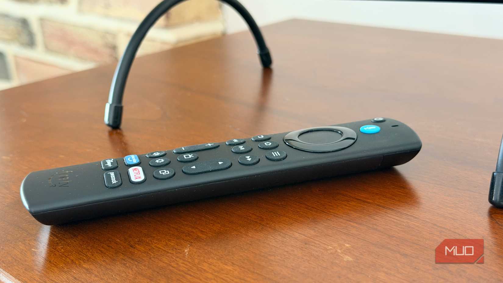 A remote for a Fire TV Cube