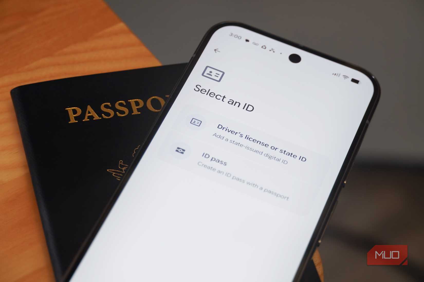 Google Wallet on an Android phone above a passport.