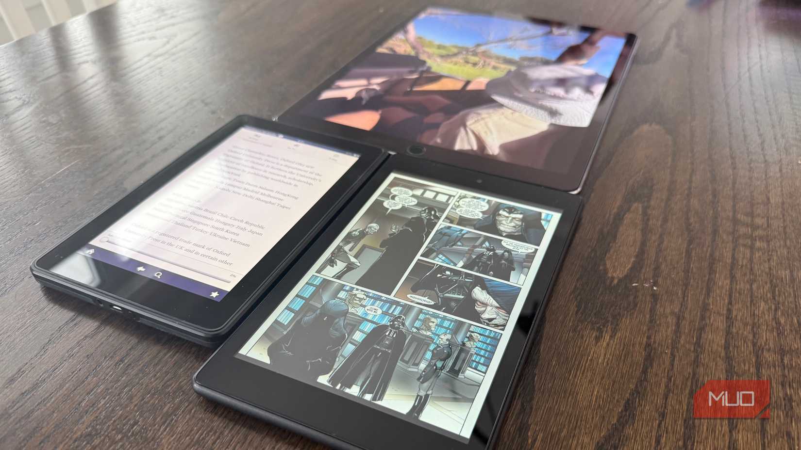 ipad pro with 2 kindle fire tables