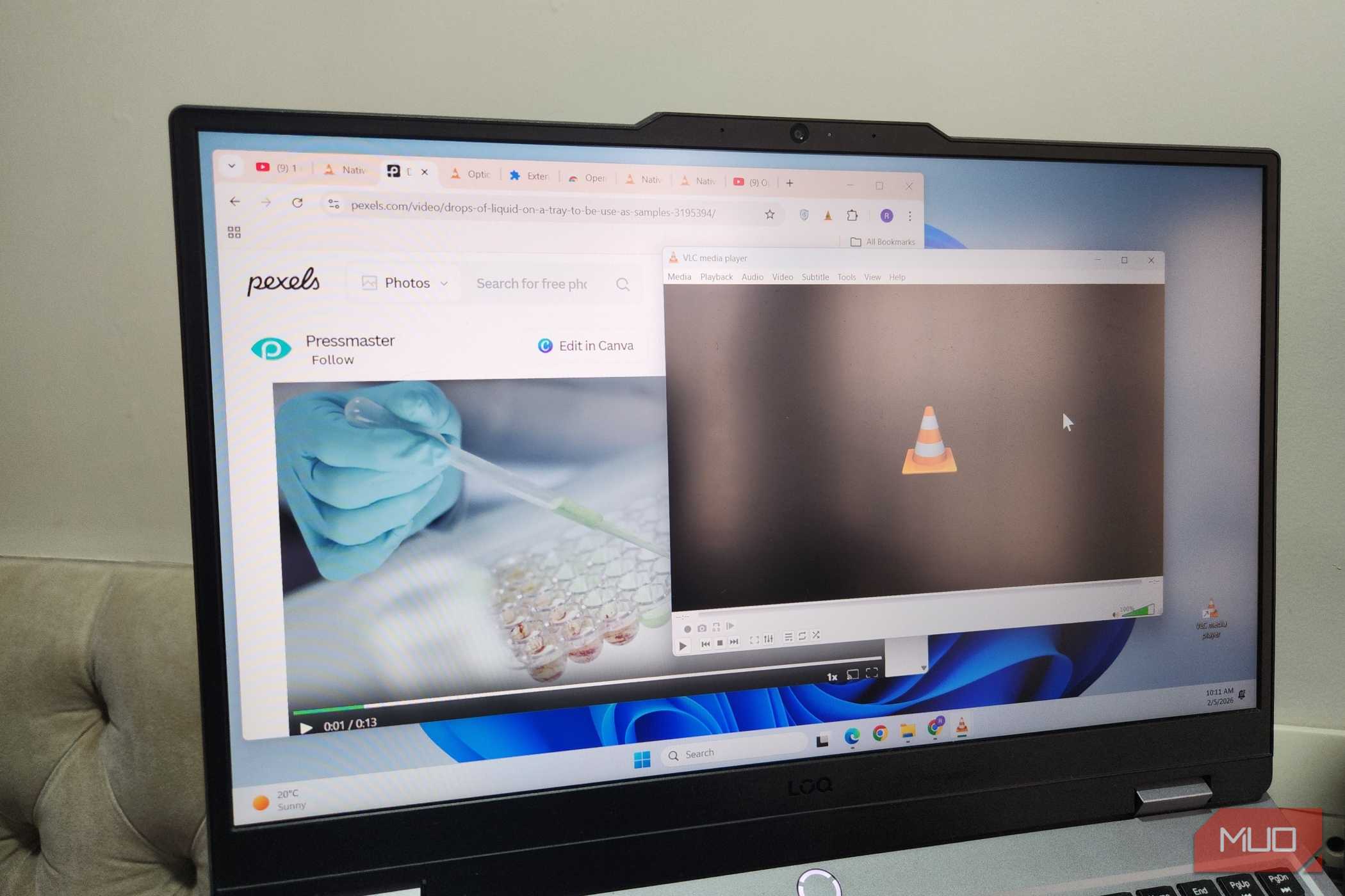 Laptop showing browser and VLC