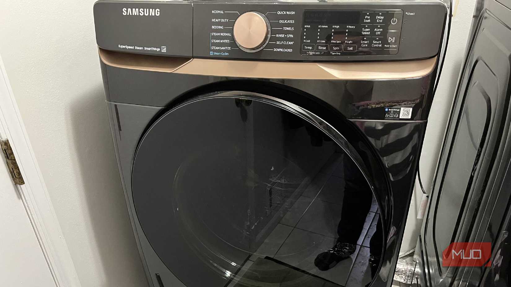 A Samsung washing machine with the door shut