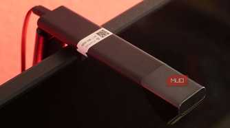 A Matter pairing code on a TV backlight.