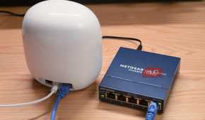 A Google Nest Wi-Fi Pro connected to an unmanaged Ethernet switch.