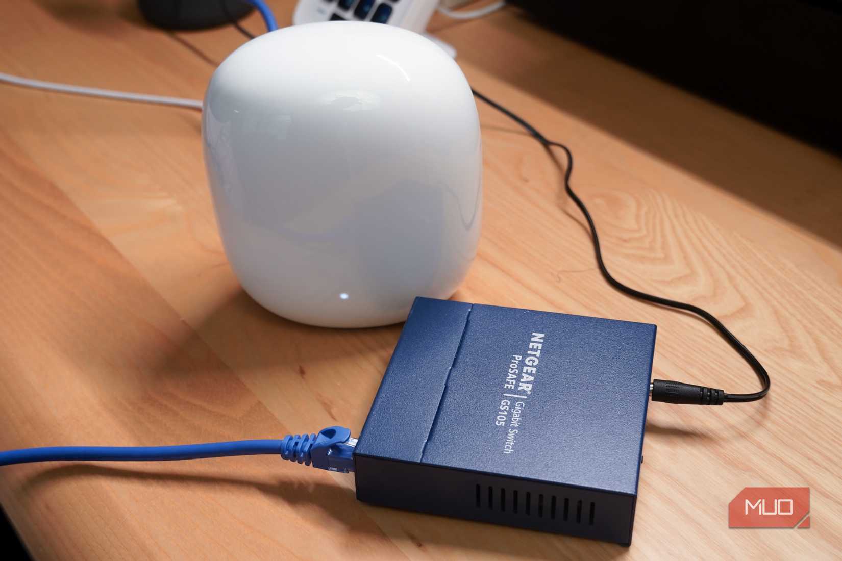 An unmanaged switch connected to a Google Nest Wi-Fi Pro router.