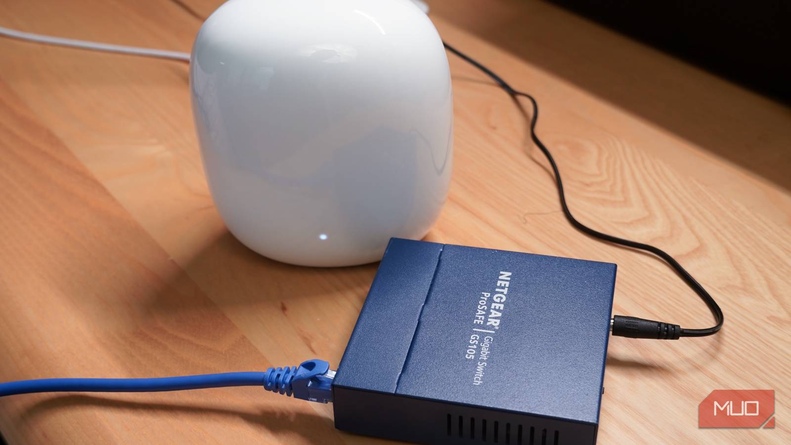 An unmanaged switch connected to a Google Nest Wi-Fi Pro router.