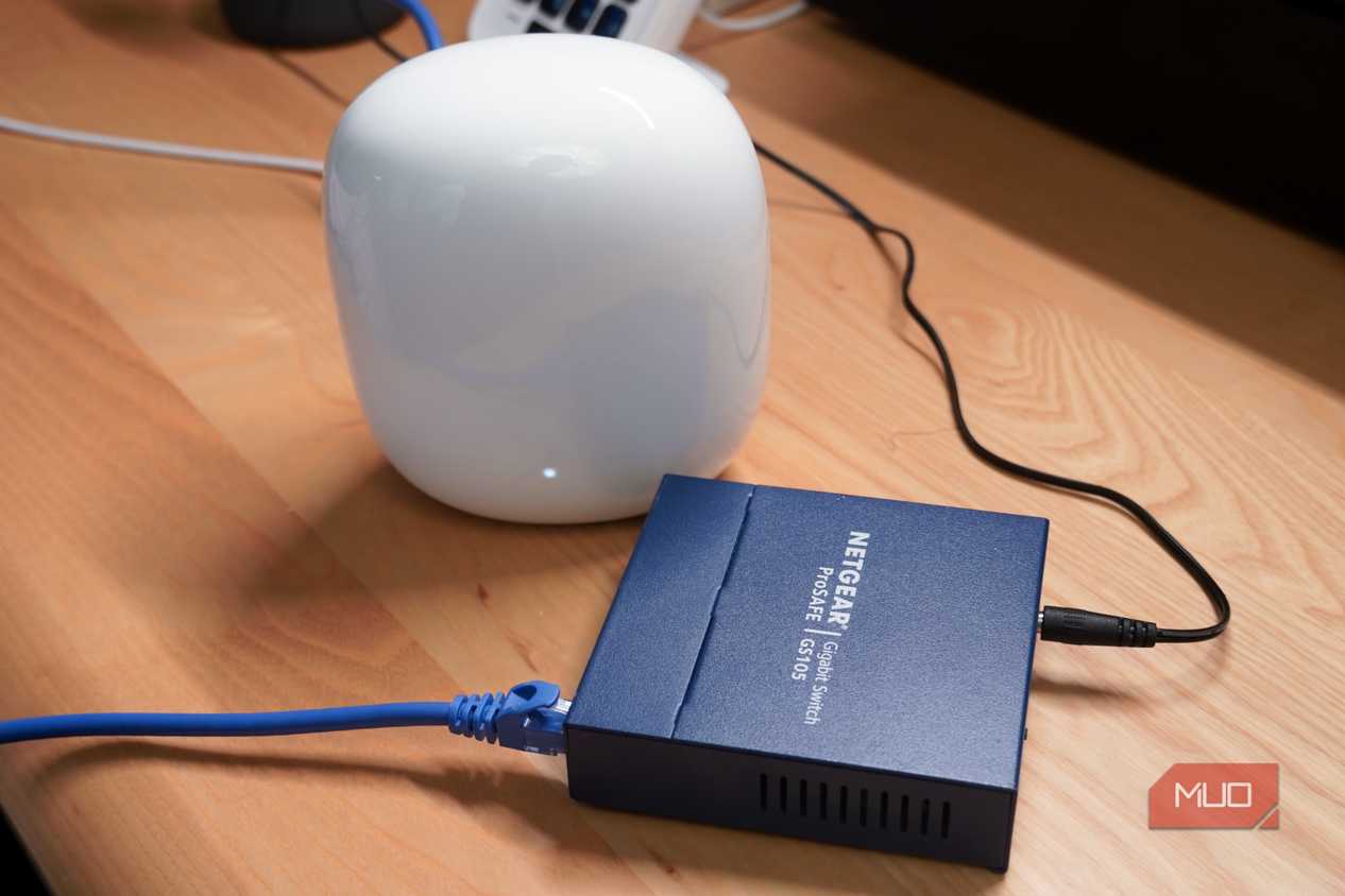 An unmanaged switch connected to a Google Nest Wi-Fi Pro router.