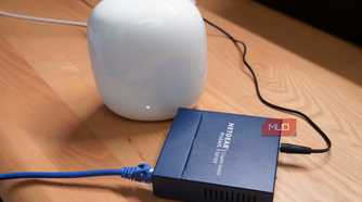 An unmanaged switch connected to a Google Nest Wi-Fi Pro router.