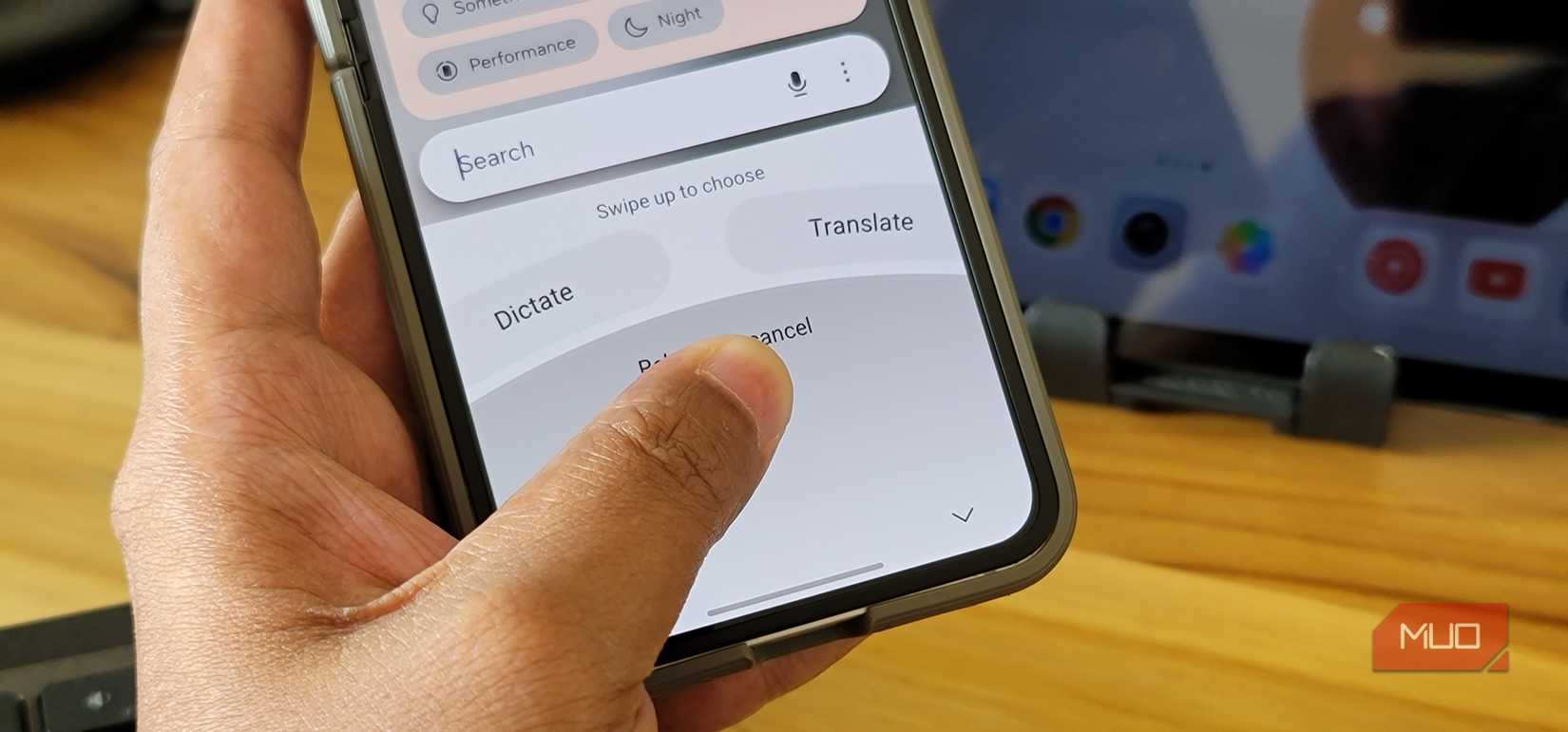 Person holding Samsung Galaxy Z Flip 6 with the Typeless app open
