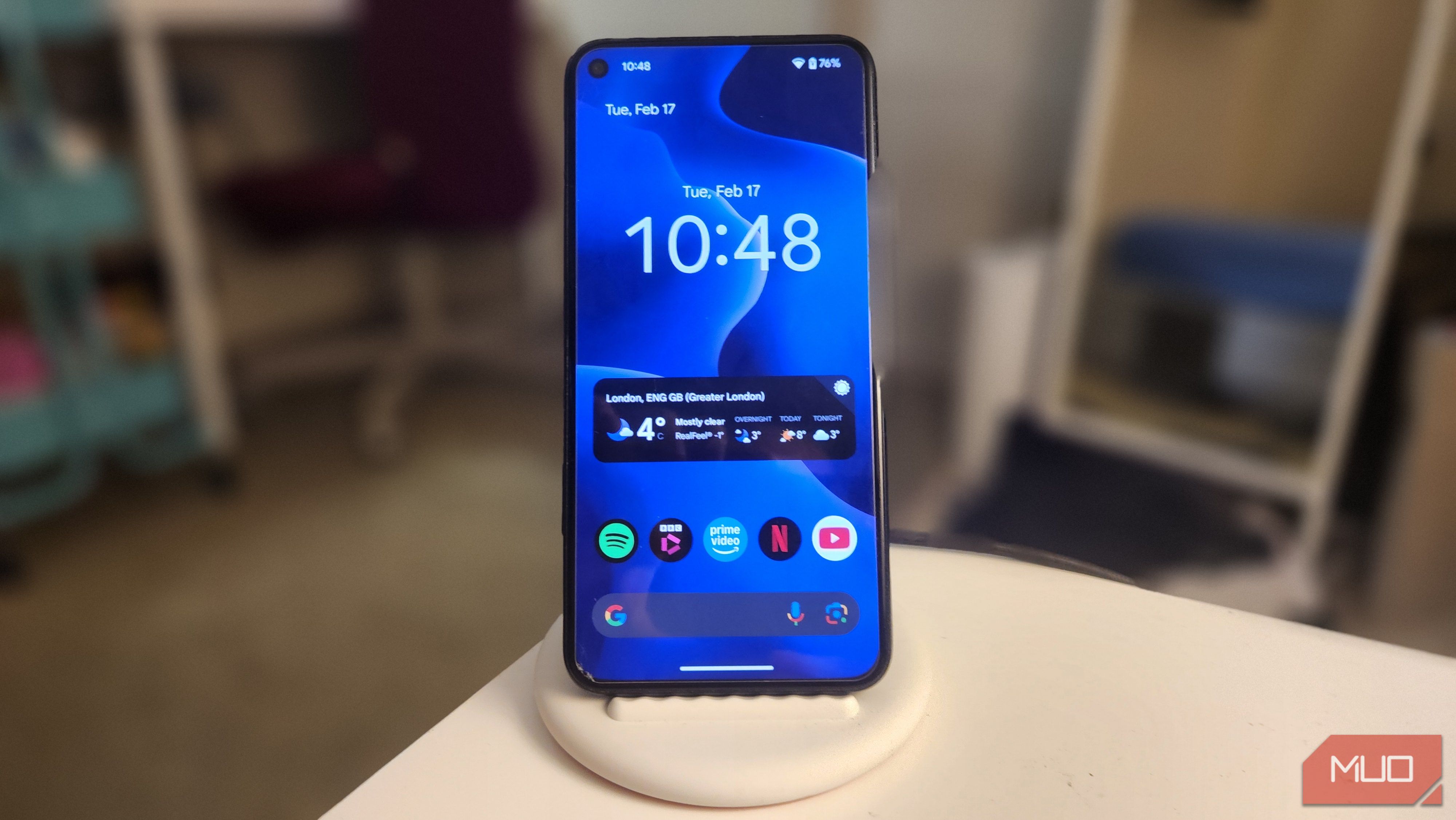 I repurposed my old Android phone as an always-on bedside assistant