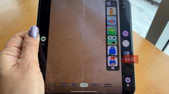 A hand holding a Google Pixel 10 Pro Fold showing different Made You Look animation options on the inner screen.