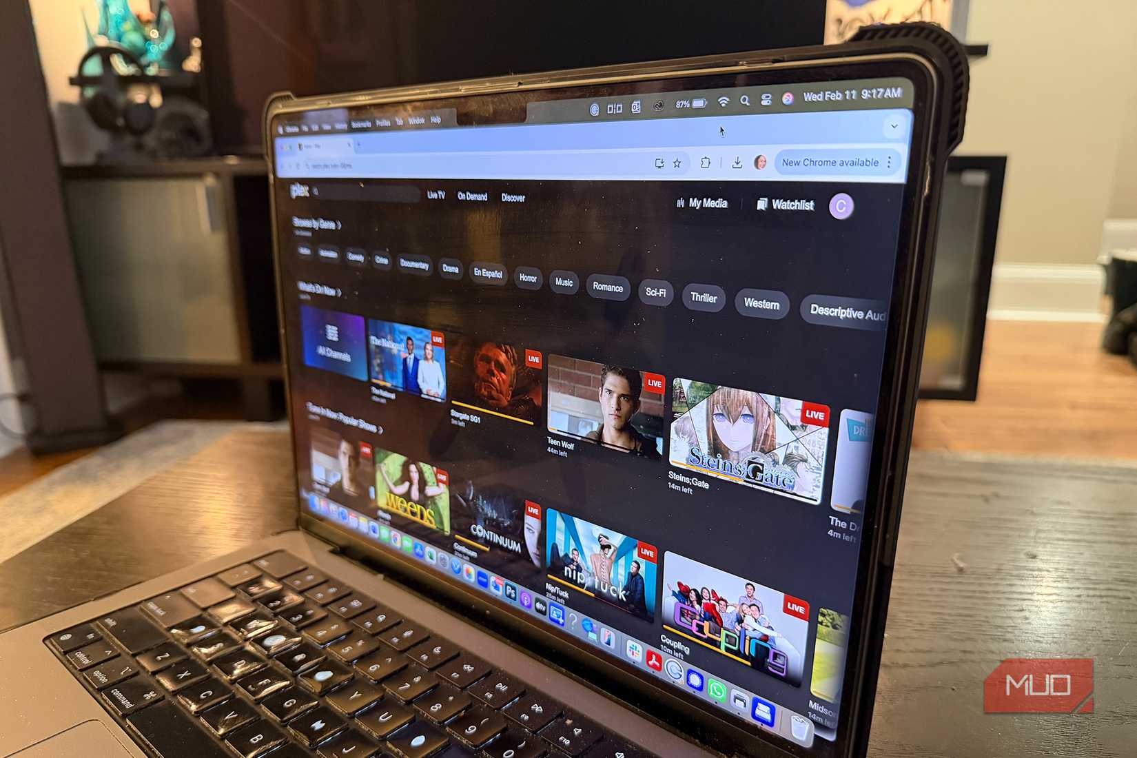 A laptop showing the on-demand guide for Plex.