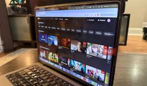 A laptop showing the on-demand guide for Plex.