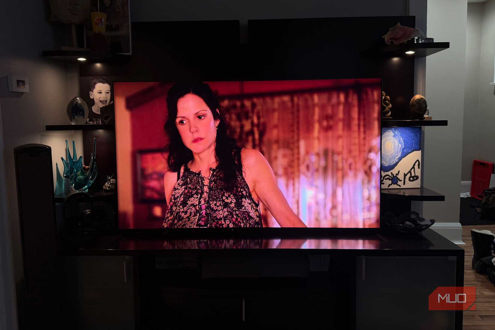 A TV showing Weeds playing from Plex.