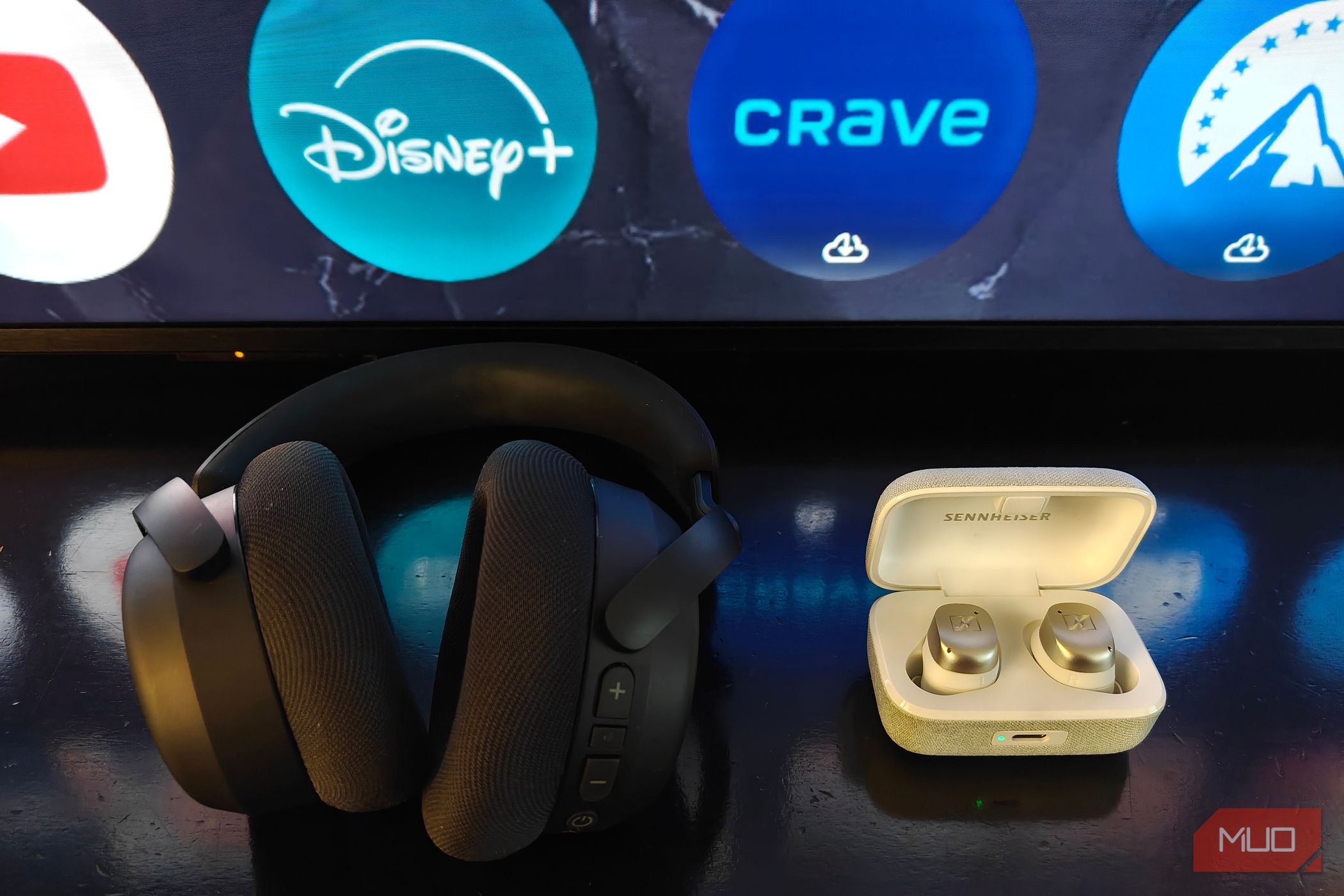 Sennheiser RS 275 headphones beside the Sennheiser Momentum True Wireless 4 earbuds.