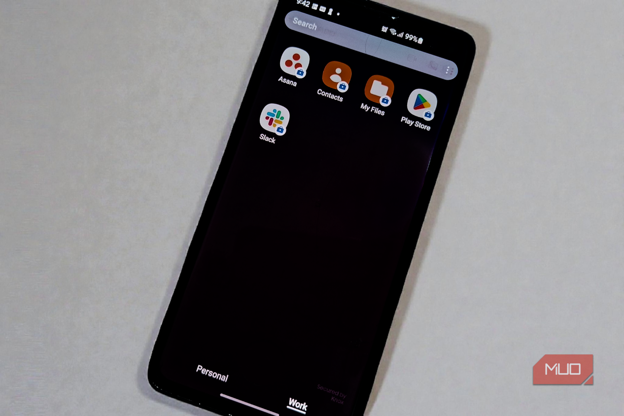 Smartphone showing isolated work profile apps, including Asana and Slack, with the Work tab selected.