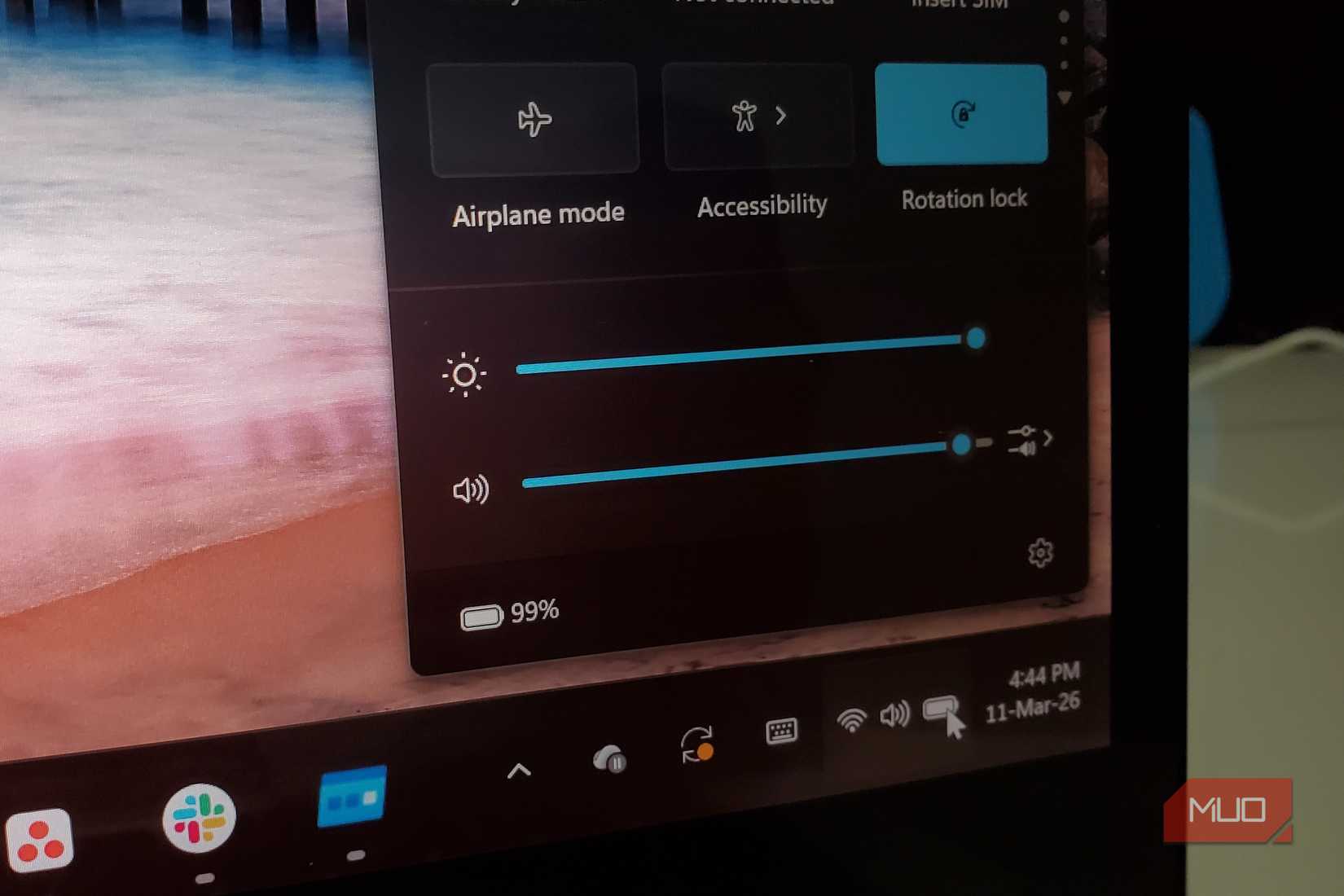 A laptop displaying a 99% battery indicator.