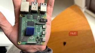 A Raspberry Pi 4 held in the palm