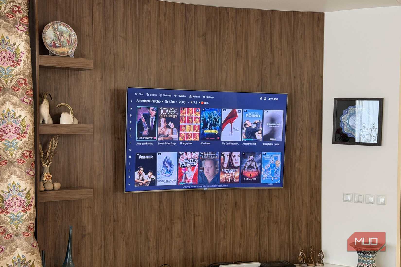 A Samsung TV running Android TV showing a list of movies