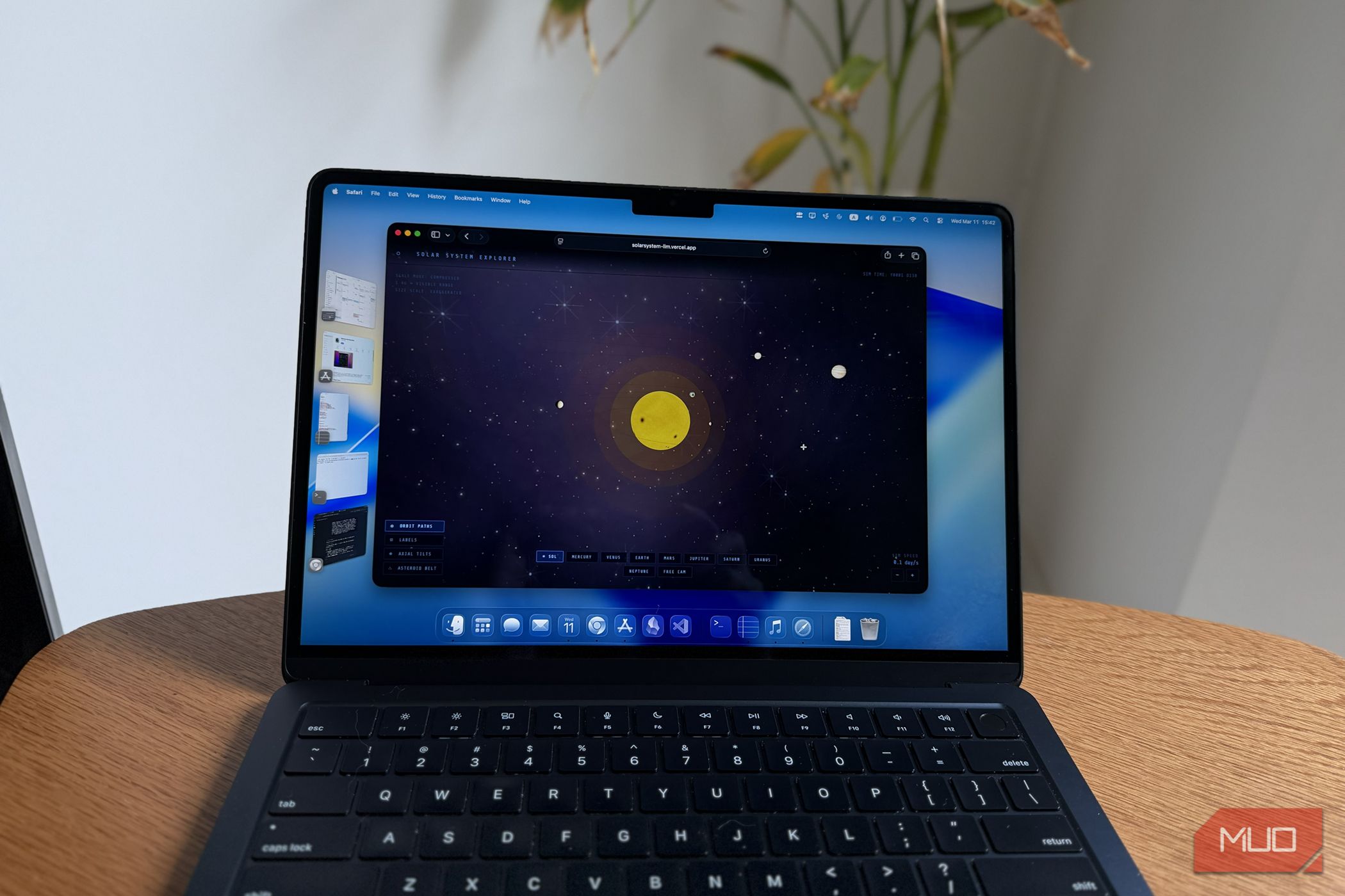 A simulation of the solar system by Claude on a MacBook