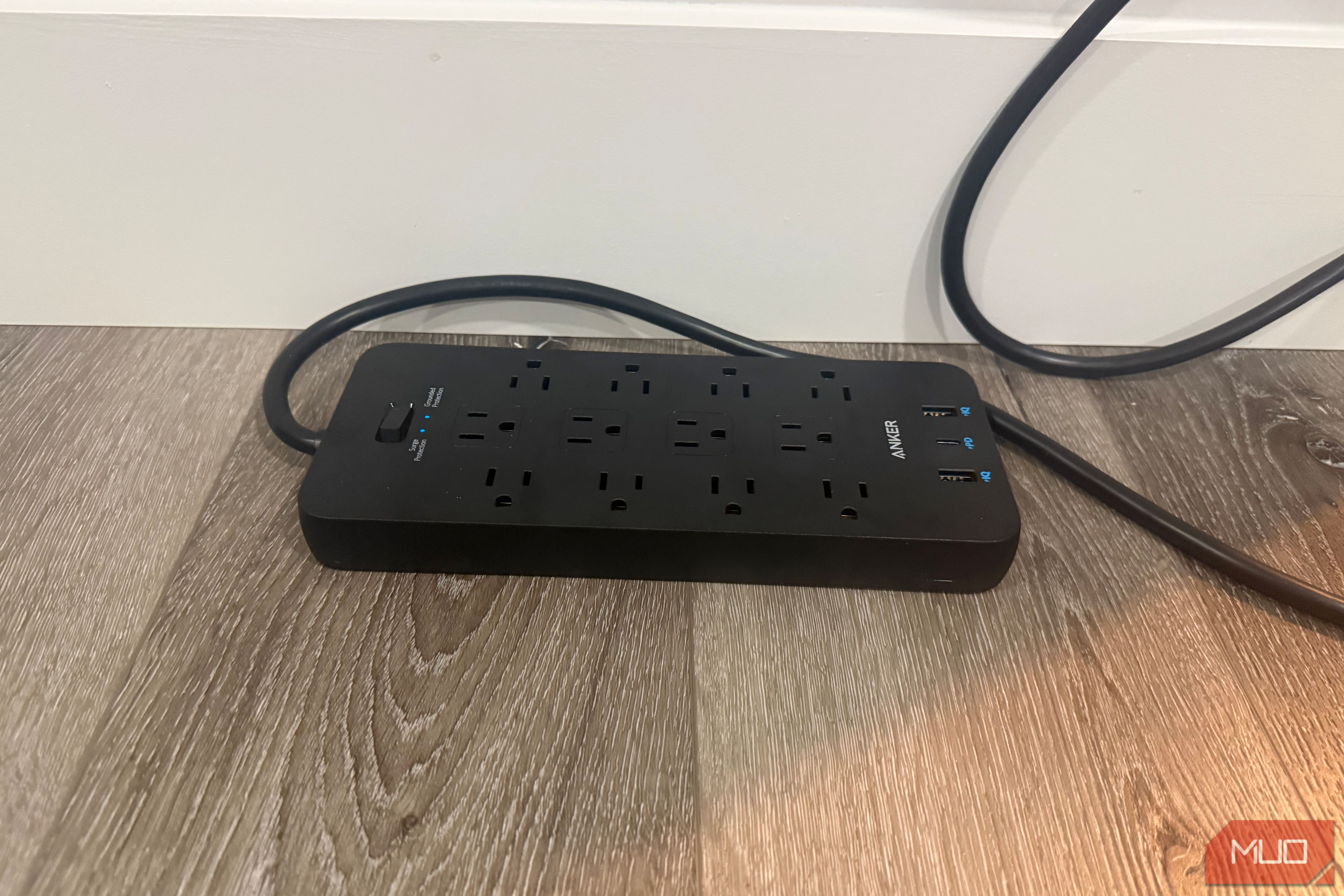 anker power strip plugged in on floor